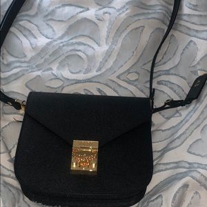 Black MCM crossbody bag